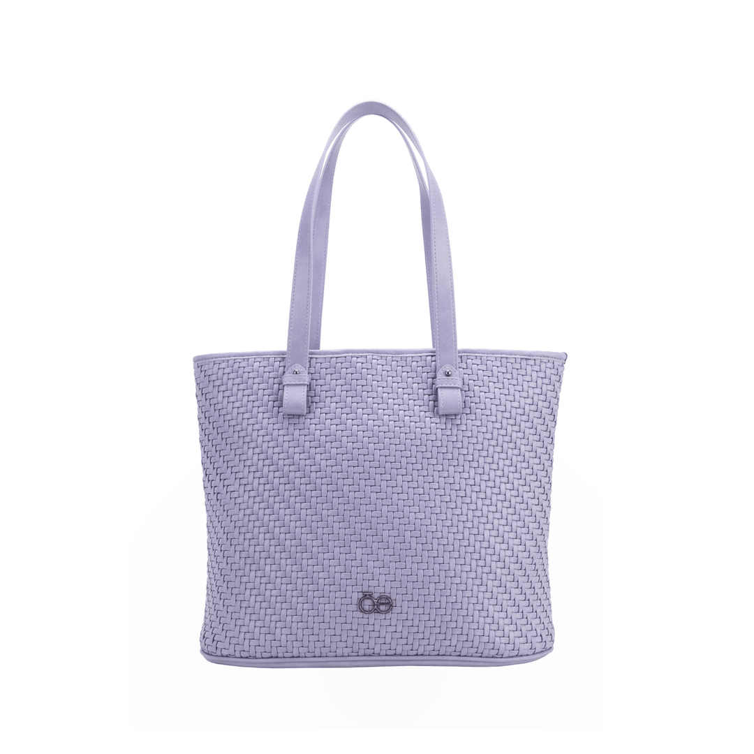 Bolsa Tote hecha con material vegano. Cuenta con cierre de larga duración.